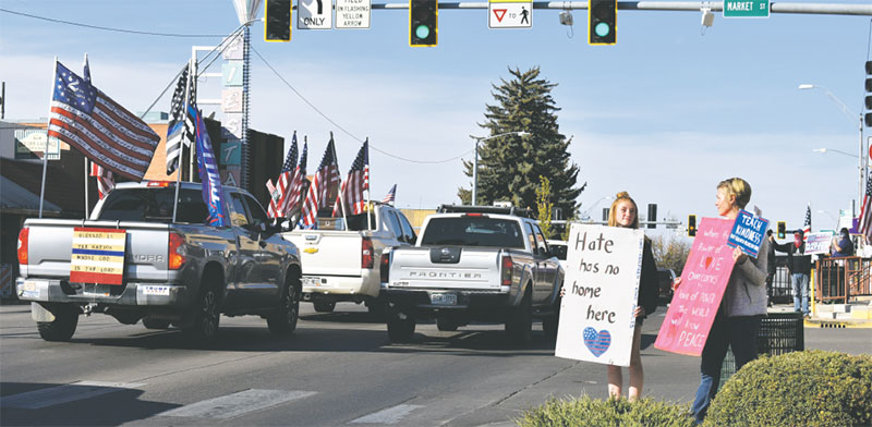 The Montezuma County Patriots drive along Main Street in Cortez on a Saturday morning in 2020.